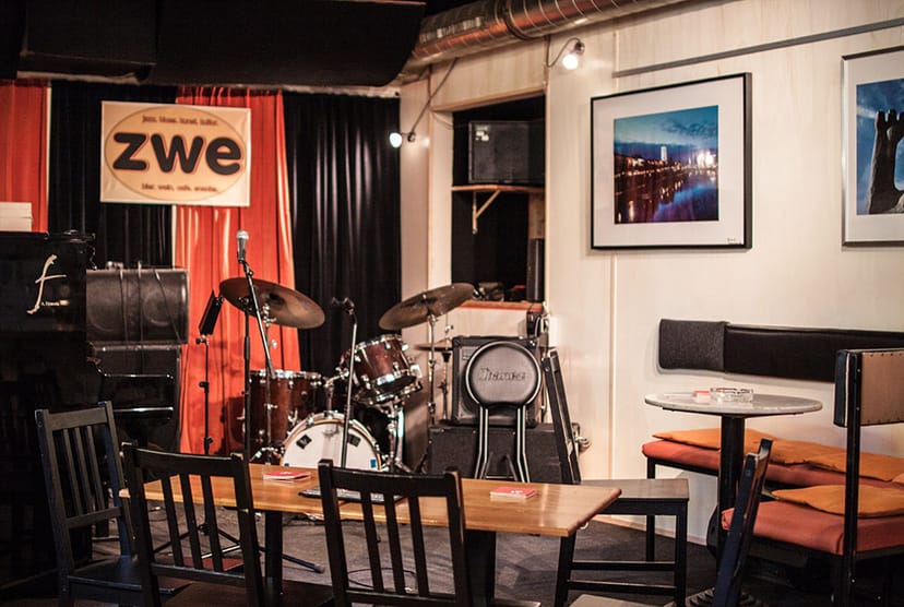 ZWE Jazz Club: Intimate event room for acoustic live music and corporate mixer functions.