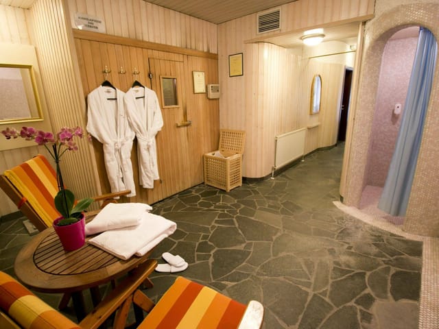 Dated hotel lounge and wellness area for VIP event planning and corporate venue rental.