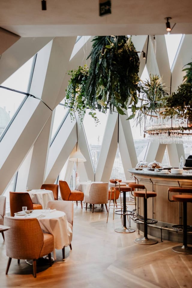 Contemporary Hotel Motto restaurant venue for luxury VIP receptions and networking events.