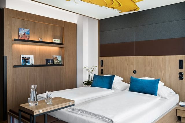 Modern boutique hotel room in Vienna for business travel and luxury accommodation.