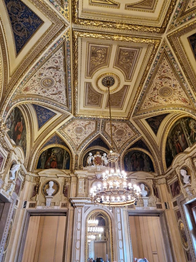 Schwindfoyer at Vienna State Opera with gilded ceilings for luxury gala or VIP dinner event.