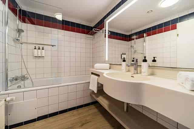 voco Vienna Prater hotel bathroom for business travel or corporate event room blocks.