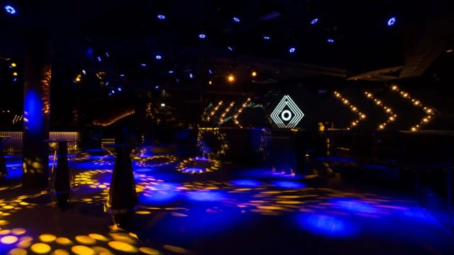 Nightclub venue with dynamic lighting for corporate events and networking launches.