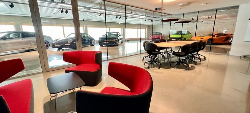 Luxury automotive branded breakout room at M12 Vienna for corporate meetings and product launches.
