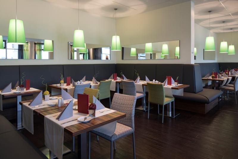 Hotel Doppio restaurant dining setup for corporate breakfast or breakout events.