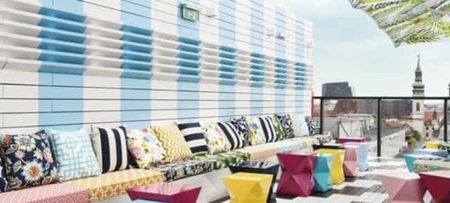 Lamée Rooftop lounge with eclectic seating, ideal for corporate networking and cocktail events.