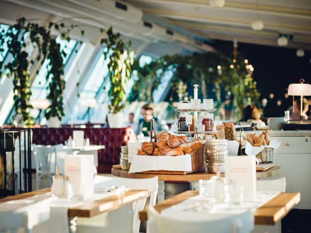 Grand Étage hotel breakfast buffet at Grand Ferdinand, elegant pastry station for business events.