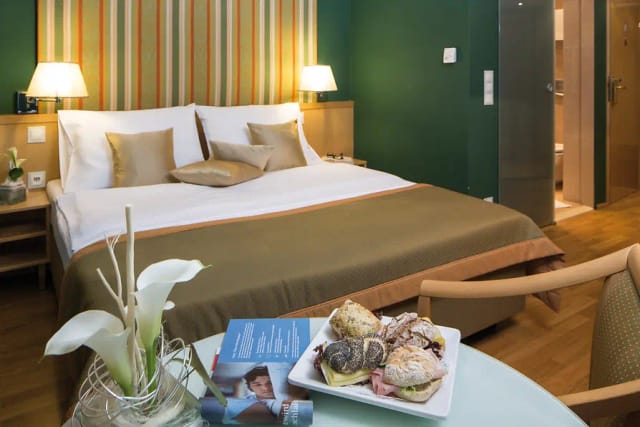 Austria Trend Hotel Ananas meeting room with refreshments for conference events and business meetings.