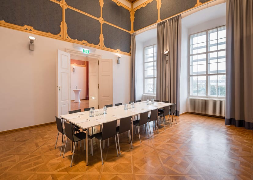 MQ Foyer boardroom with high ceilings for executive meetings and collaborative workshops.