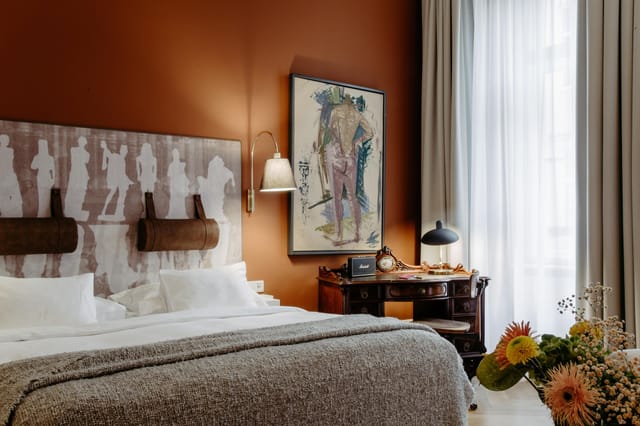 VIP hotel suite with workspace for executive business travel and luxury conference accommodation.