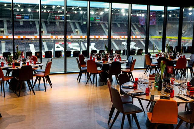 VIP CUBE hospitality suite with stadium view for corporate banquet and VIP events.