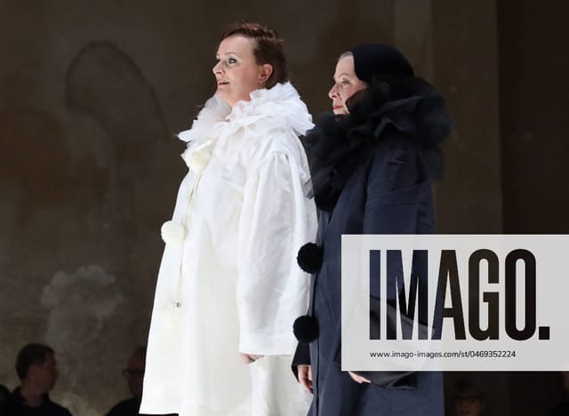 Avant-garde fashion showcase in REAKTOR theater with minimalist staging for brand event.