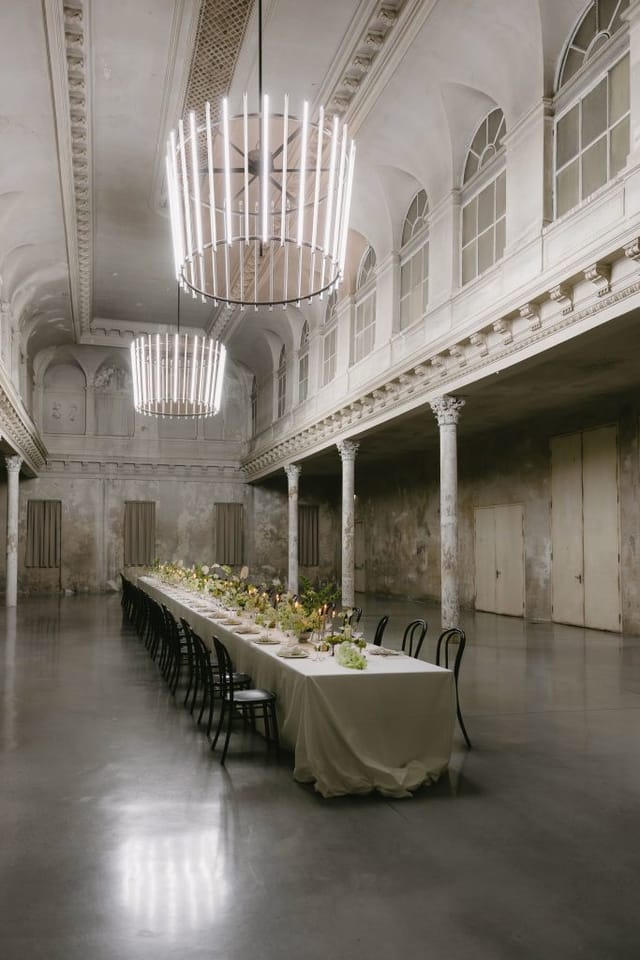 Ballroom in REAKTOR: historic venue with modern lighting for gala dinners and corporate events.