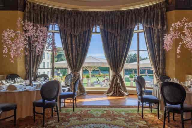 Elegant ballroom at Radisson Blu Dublin with floor-to-ceiling windows for weddings and events.