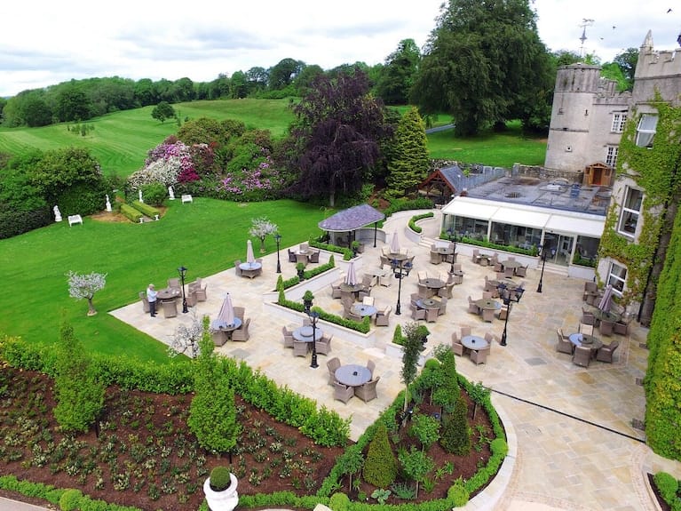 Cabra Castle terrace for luxury corporate events and gala dinners in a historic garden setting.