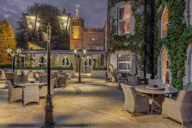 Cabra Castle terrace with ambient lighting for outdoor networking receptions and gala events.