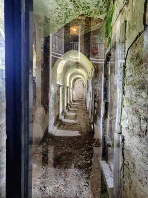 Cork City Gaol interior: rustic stone architecture for historic venue and event site scouting.