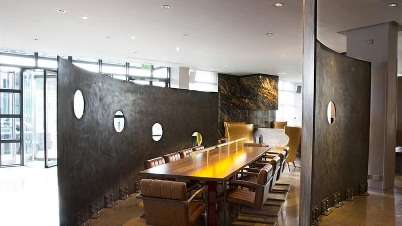 The Spencer Hotel boardroom with ergonomic seating for executive strategy and VIP meetings.
