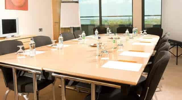 Green Isle Hotel boardroom: professional meeting space for corporate events and small conferences.