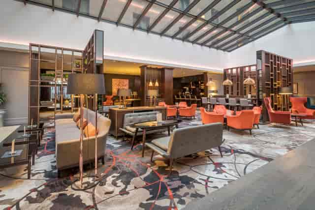 Clayton Hotel Leopardstown atrium: airy event space for networking and corporate conferences.