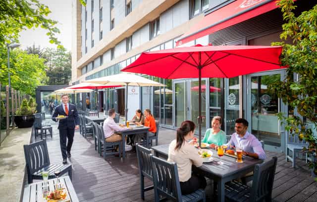 Upscale outdoor restaurant patio at Clayton Hotel Leopardstown for corporate networking events.