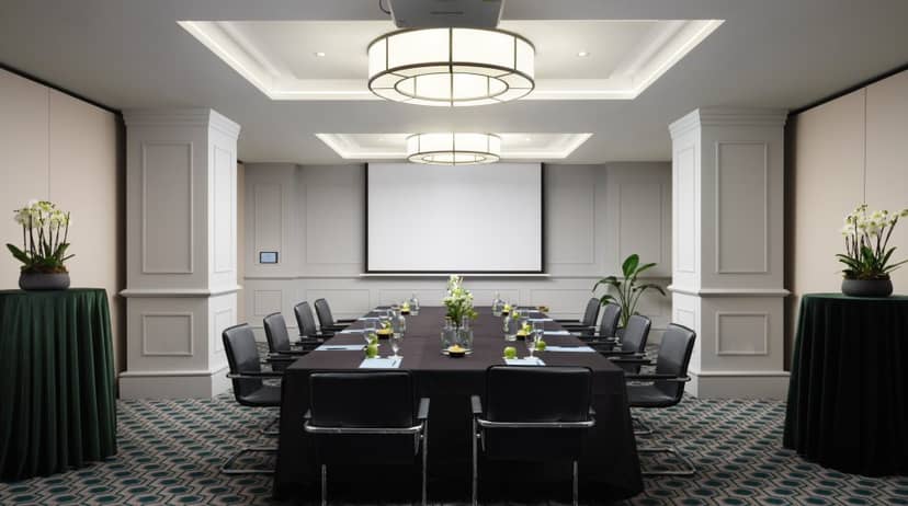 Boardroom at McGettigan Hotels with formal decor for corporate meetings and executive events.