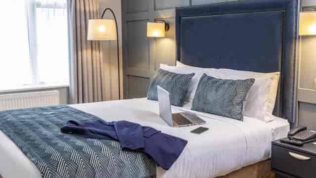 Wilfield & Gilford Suites hotel room office setup for business travel and remote work.