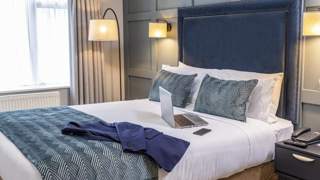 Wilfield & Gilford Suites hotel room office setup for business travel and remote work.