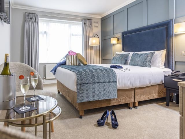 Upscale hotel room for VIP incentive travel or corporate event accommodation.