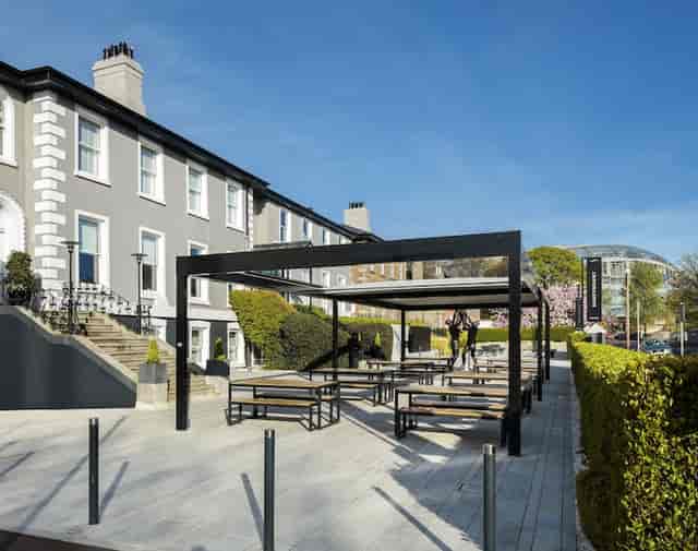 Modern covered breakout area at Sandymount Hotel for corporate events and networking.