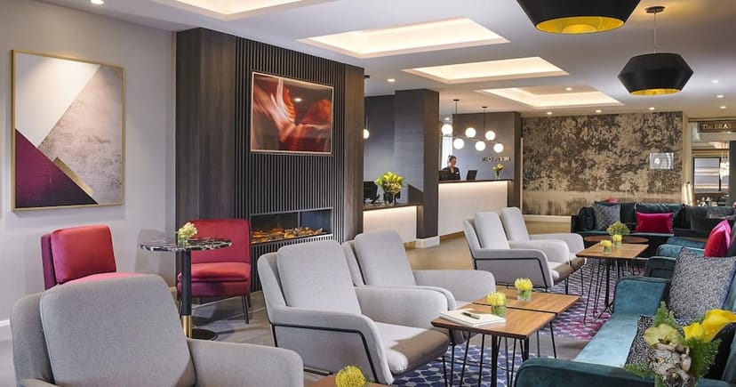 Modern hotel lobby at Fairways Convention Centre for corporate networking and business meetings.