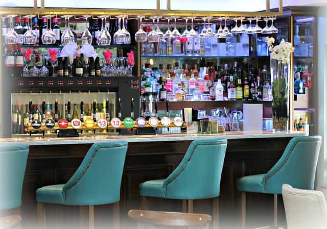 Elegant hotel bar in Hanger 6, perfect for corporate networking and conference receptions.