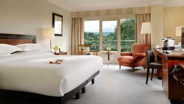 Executive hotel room with workspace for business travel and corporate events at Herbert Park Hotel.