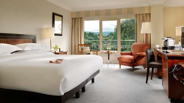 Executive hotel room with workspace for business travel and corporate events at Herbert Park Hotel.