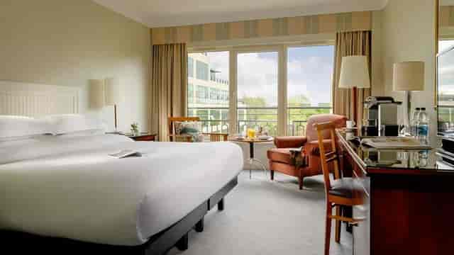 Herbert Park Hotel business guest room with workspace for corporate events and conferences.