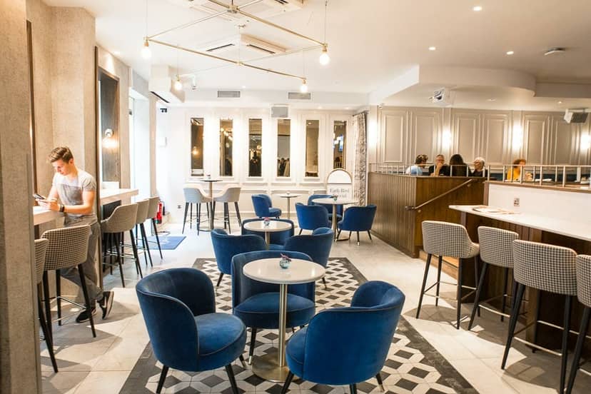 Modern restaurant breakout space in The Morgan Hotel for professional networking and coworking.