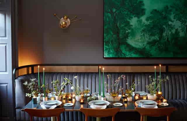 Private dining at The Devlin: intimate moody VIP dinner setting for executive retreats.