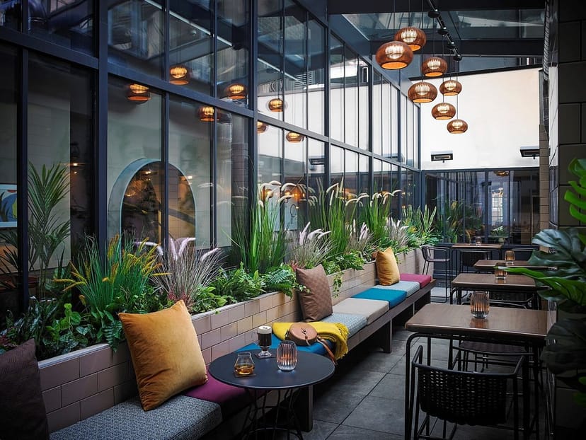 High-end indoor patio with ambient lighting for corporate networking and cocktail receptions.