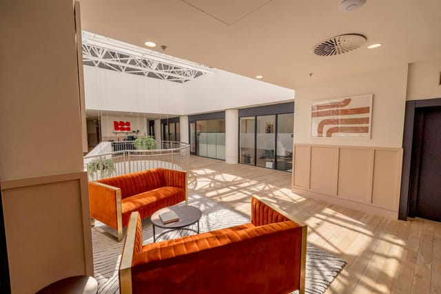 Vibrant Smyth House breakout room with natural light for networking and corporate events.