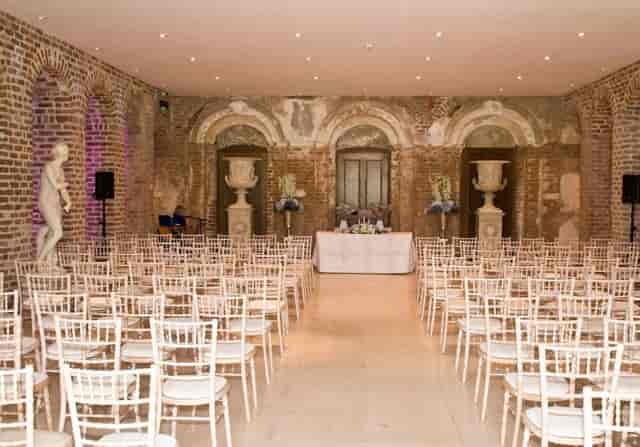 Georgian ballroom at Powerscourt Estate with brick arches for elegant weddings and corporate events.
