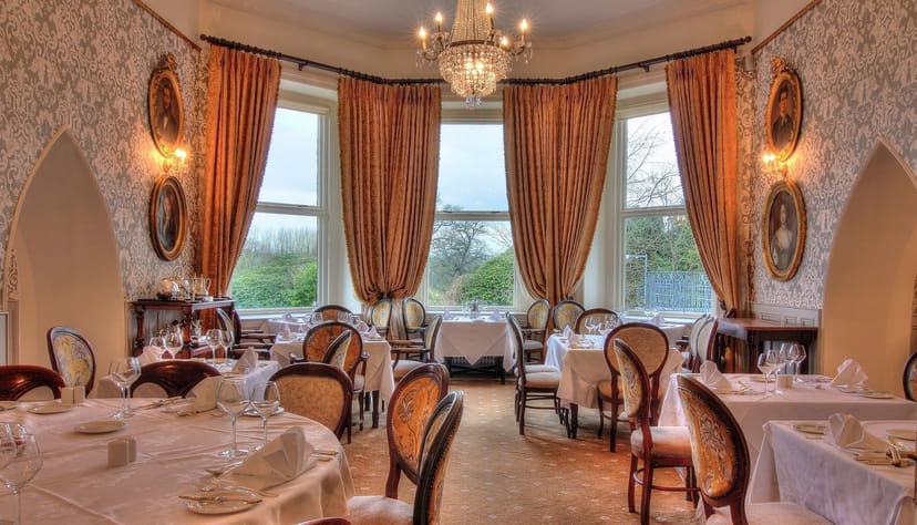 Elegant historic dining room at The Courtroom Restaurant for VIP dinners and wedding receptions.