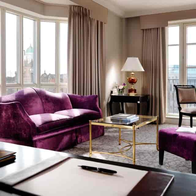 The Club Lounge boardroom with upscale seating for intimate VIP meetings and professional events.
