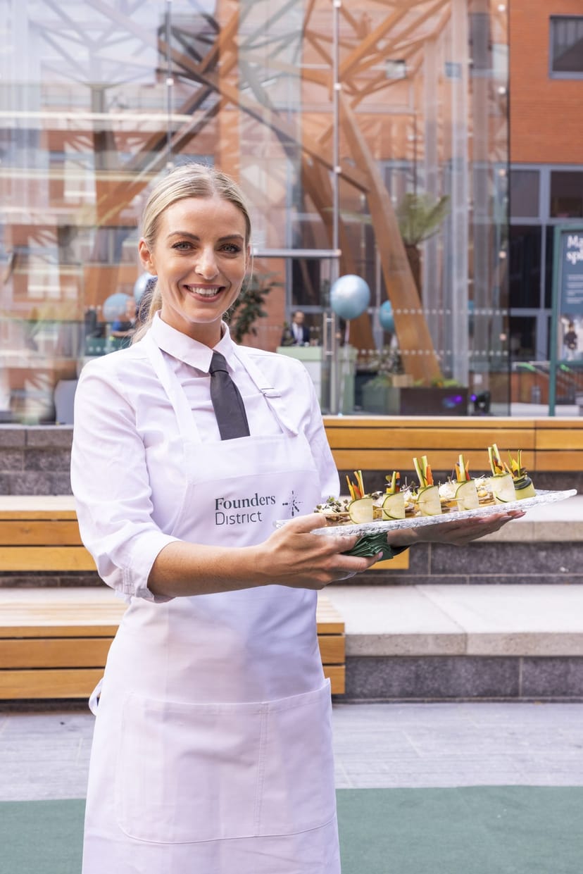 Professional caterer in bright upscale venue for corporate events and gala hospitality.