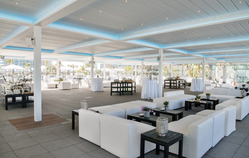 Glasshouse Purobeach Barcelona: Modern terrace for luxury corporate networking and evening events.