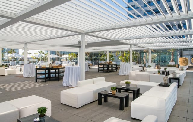 Glasshouse outdoor terrace at Hilton Barcelona for corporate networking reception and events.