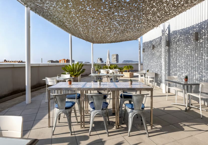 Industrial rooftop terrace in Barcelona, ideal for networking events and corporate breakout sessions.