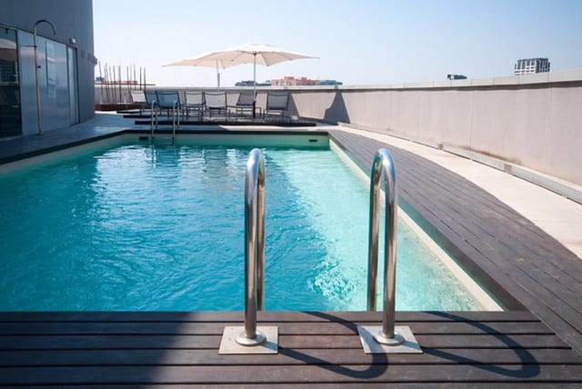 Rooftop breakout space at Hotel Barcelona Condal Mar for corporate cocktail hours and VIP mixers.