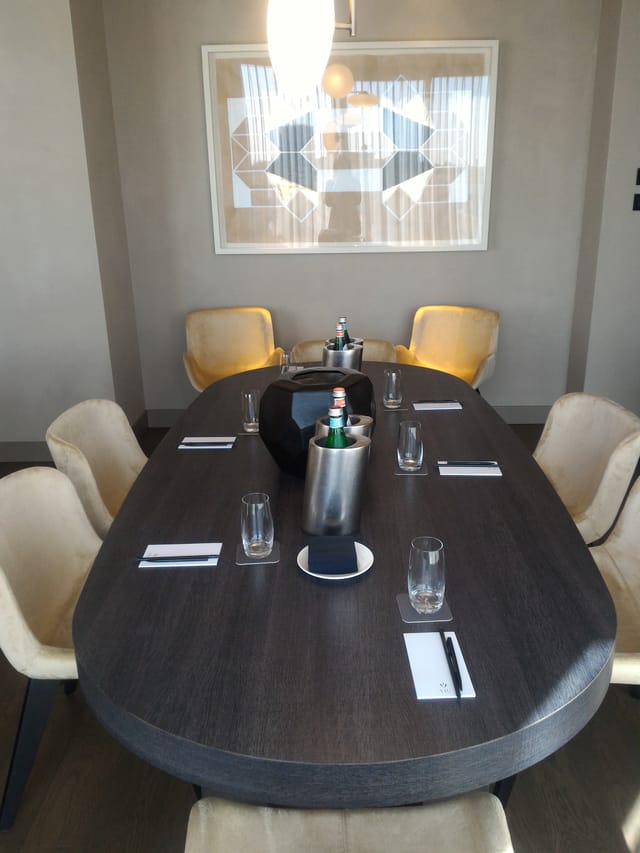 The VIU Suite boardroom with upholstered seating for executive meetings and private events.