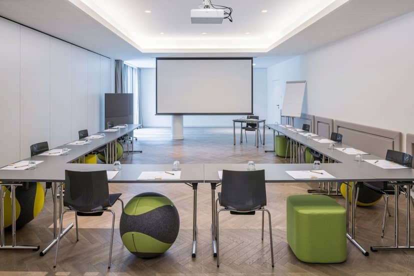 U-shape conference room with ergonomic seating for modern business meetings and corporate events.