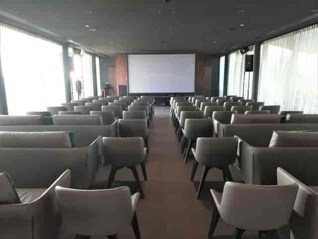 The VIU Terrace theater setup: intimate executive screening space for corporate presentations.